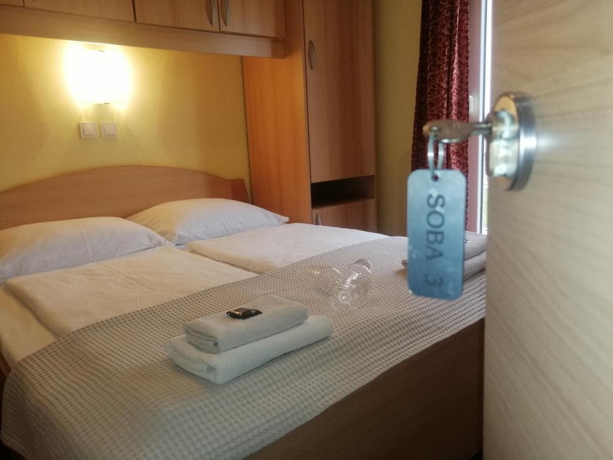 Apartmani Simon Lopar Cameră foto